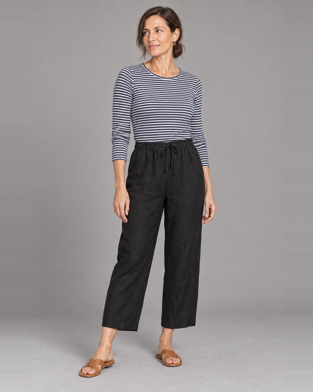 Bryn Walker Saba Pant in Black, light linen, front view on model