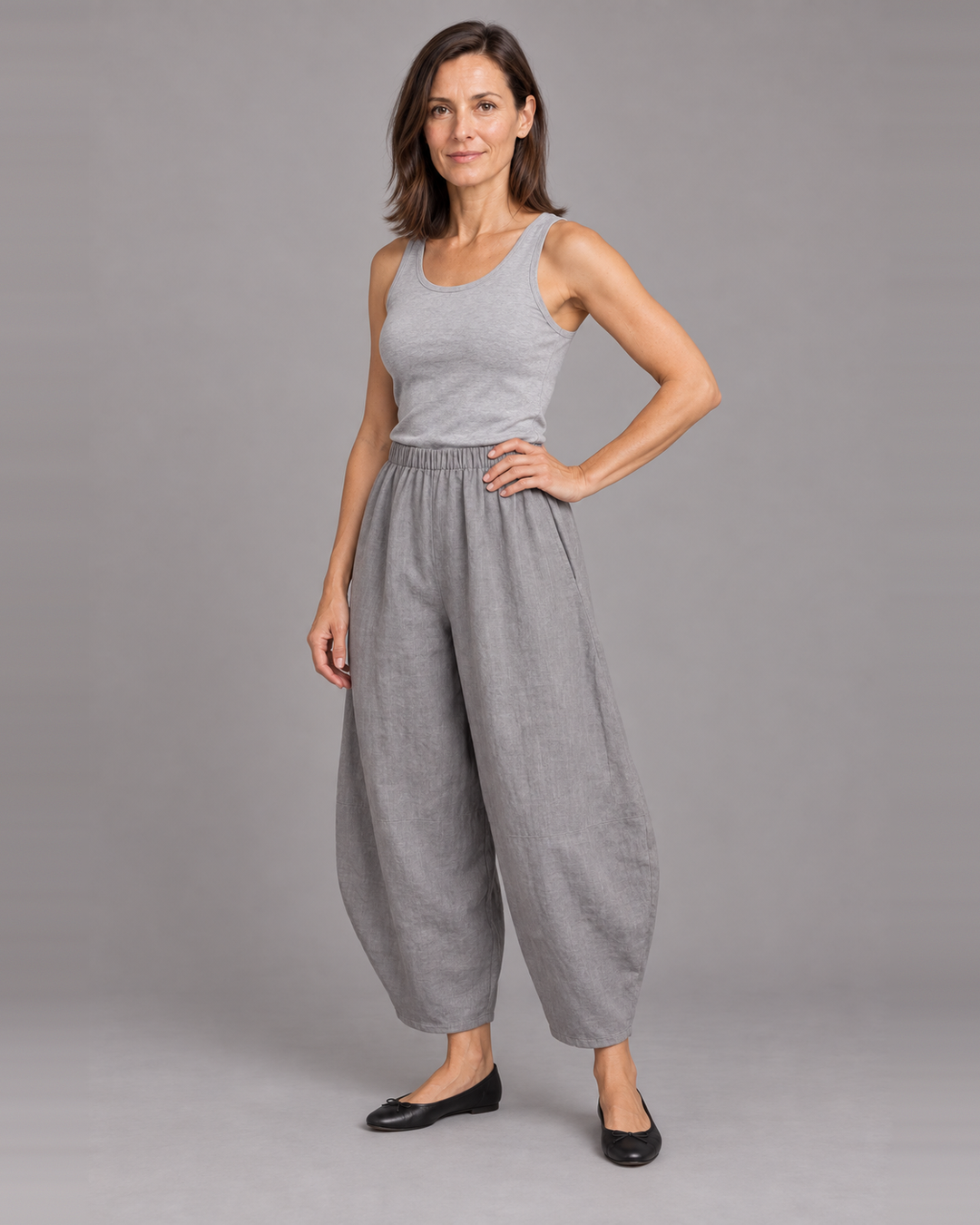 Bryn Walker Oliver Pant in Gru, light linen, front view on model