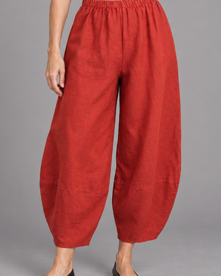 Bryn Walker Oliver Pant in Rambutan, heavy linen, detail view on model