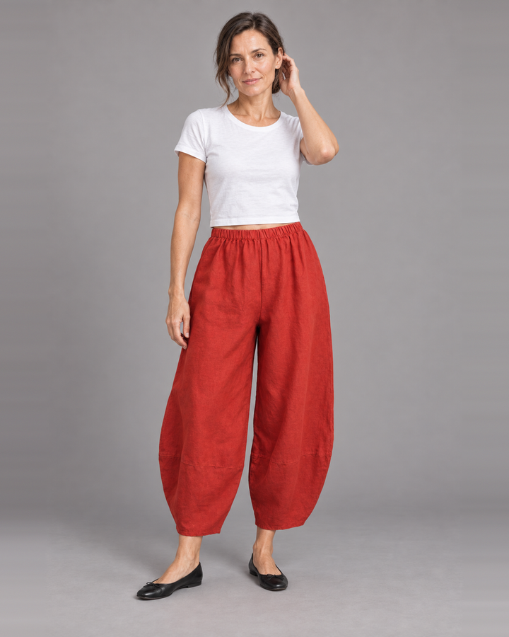 Bryn Walker Oliver Pant in Rambutan, heavy linen, front view on model