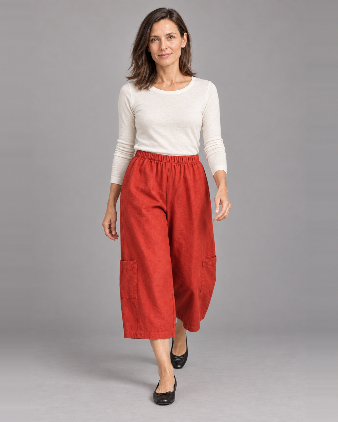 Bryn Walker Casbah Pant in Rambutan, heavy linen, front view on model