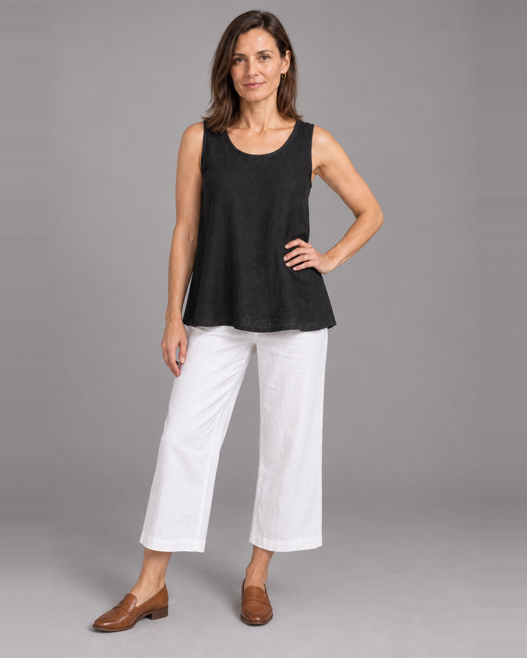 Bryn Walker Huxley Tank in Black, light linen, front view on model