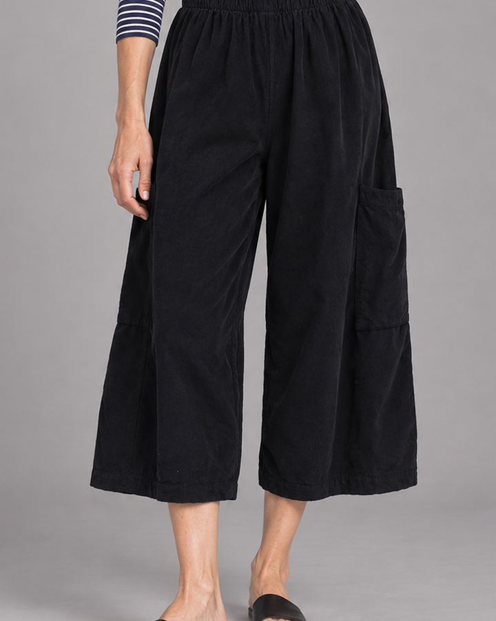 Bryn Walker Pasha Pant in Black, granada corduroy, detail view on model