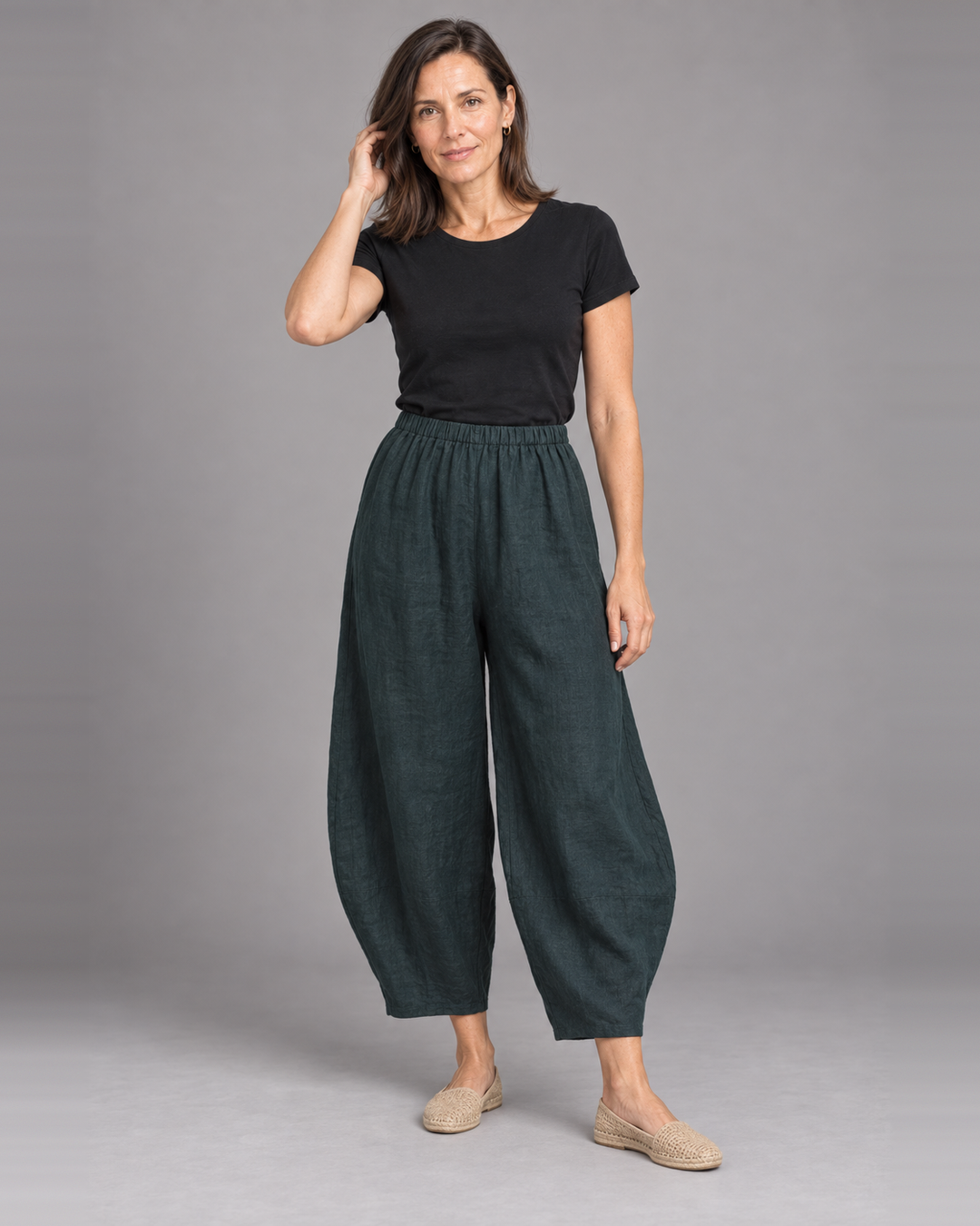 Bryn Walker Oliver Pant in Lyrebird, light linen, front view on model