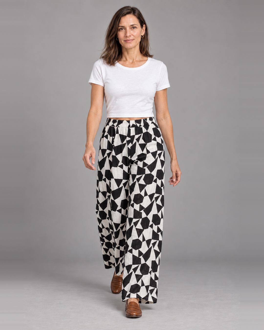 Bryn Walker Osca Pant in Cream, print light linen, front view on model