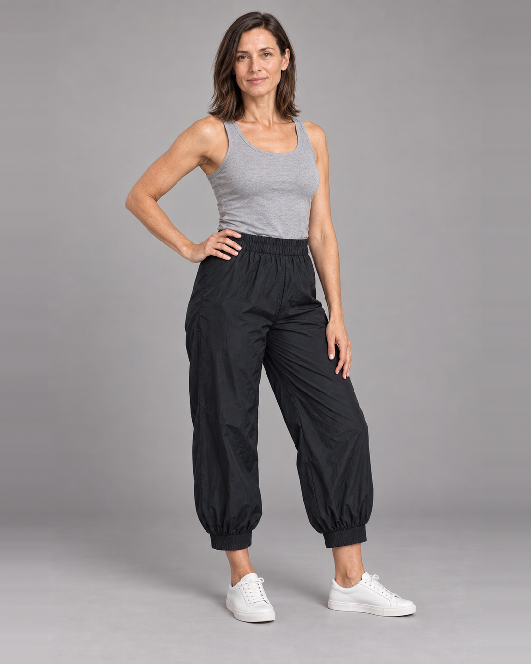 Bryn Walker Wyatt Pant in Black, memory crunch, front view on model