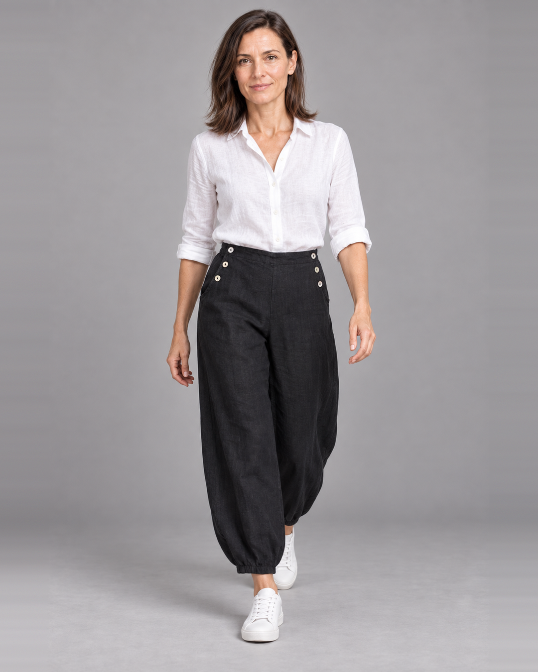 Bryn Walker Genie Pant in Black, light linen, front view on model