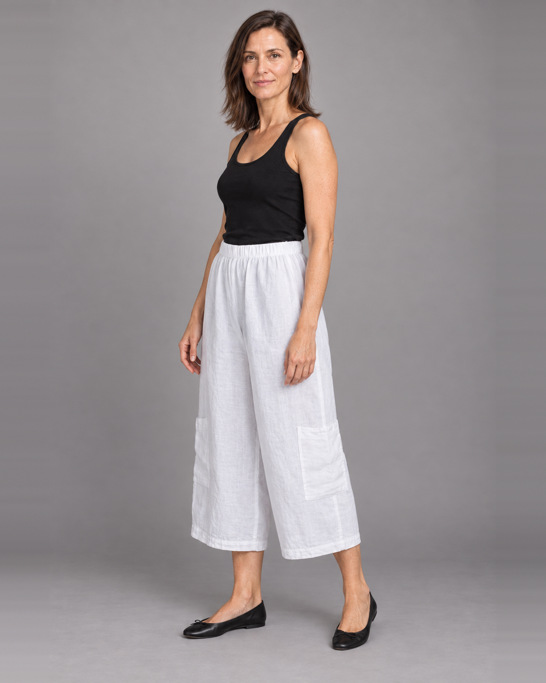 Bryn Walker Casbah Pant in White, light linen, front view on model