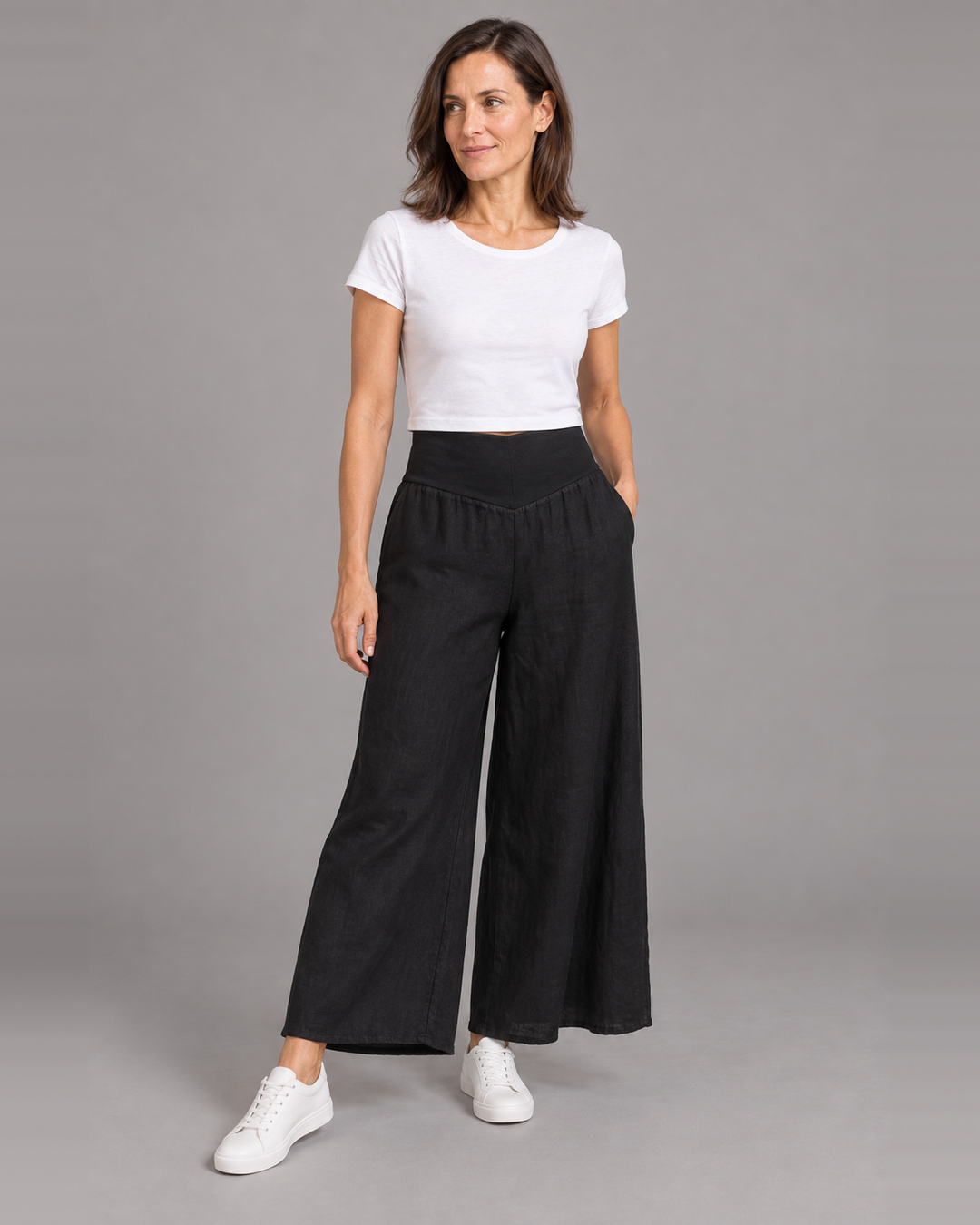Bryn Walker Ella Pant in Black, light linen, front view on model