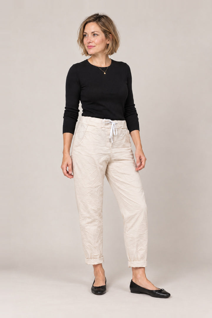 Boutique Karma Basic Jogger in Beige, angle view on model
