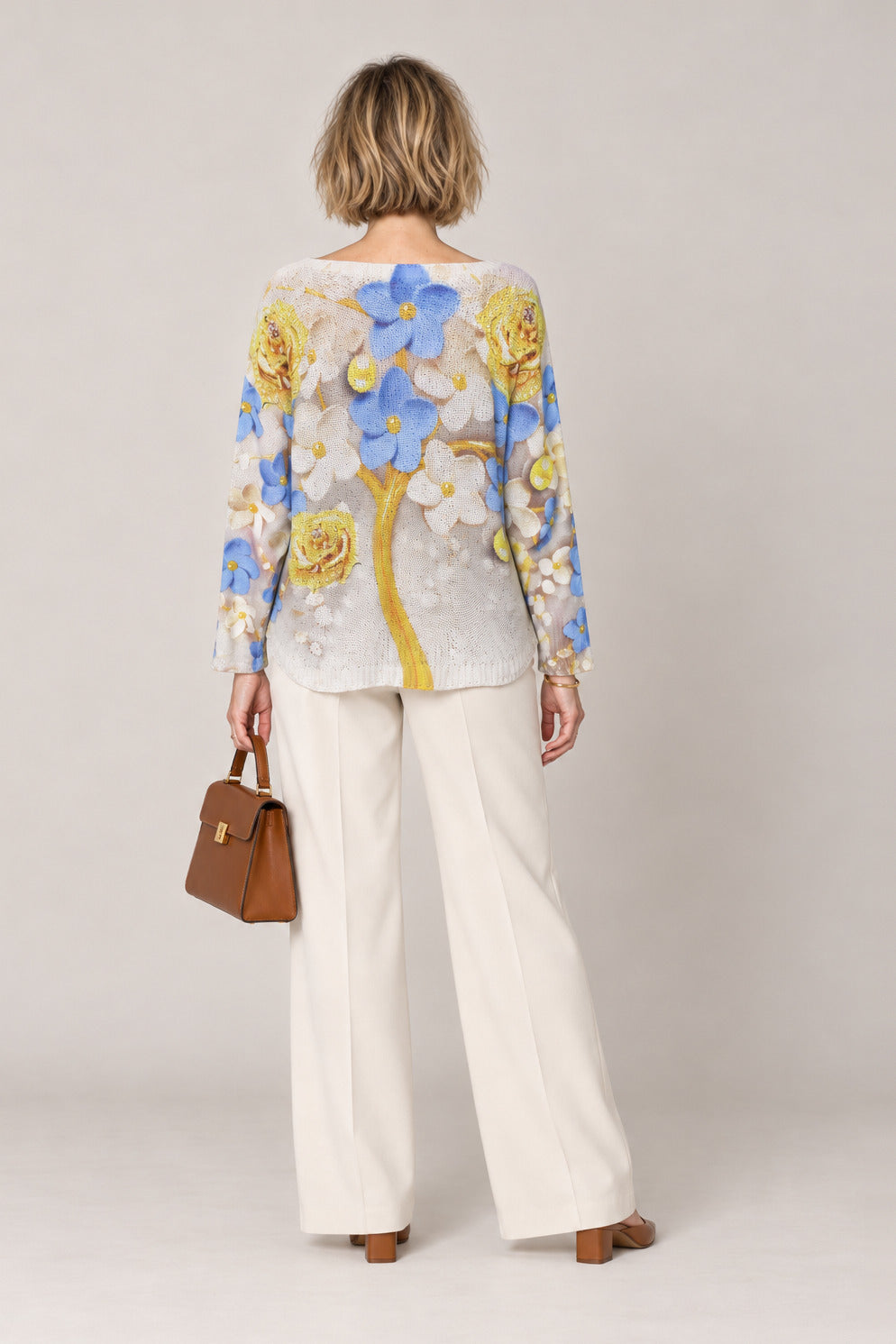 Boutique Karma Pullover Print in Blue/Yellow Florals, back view on model