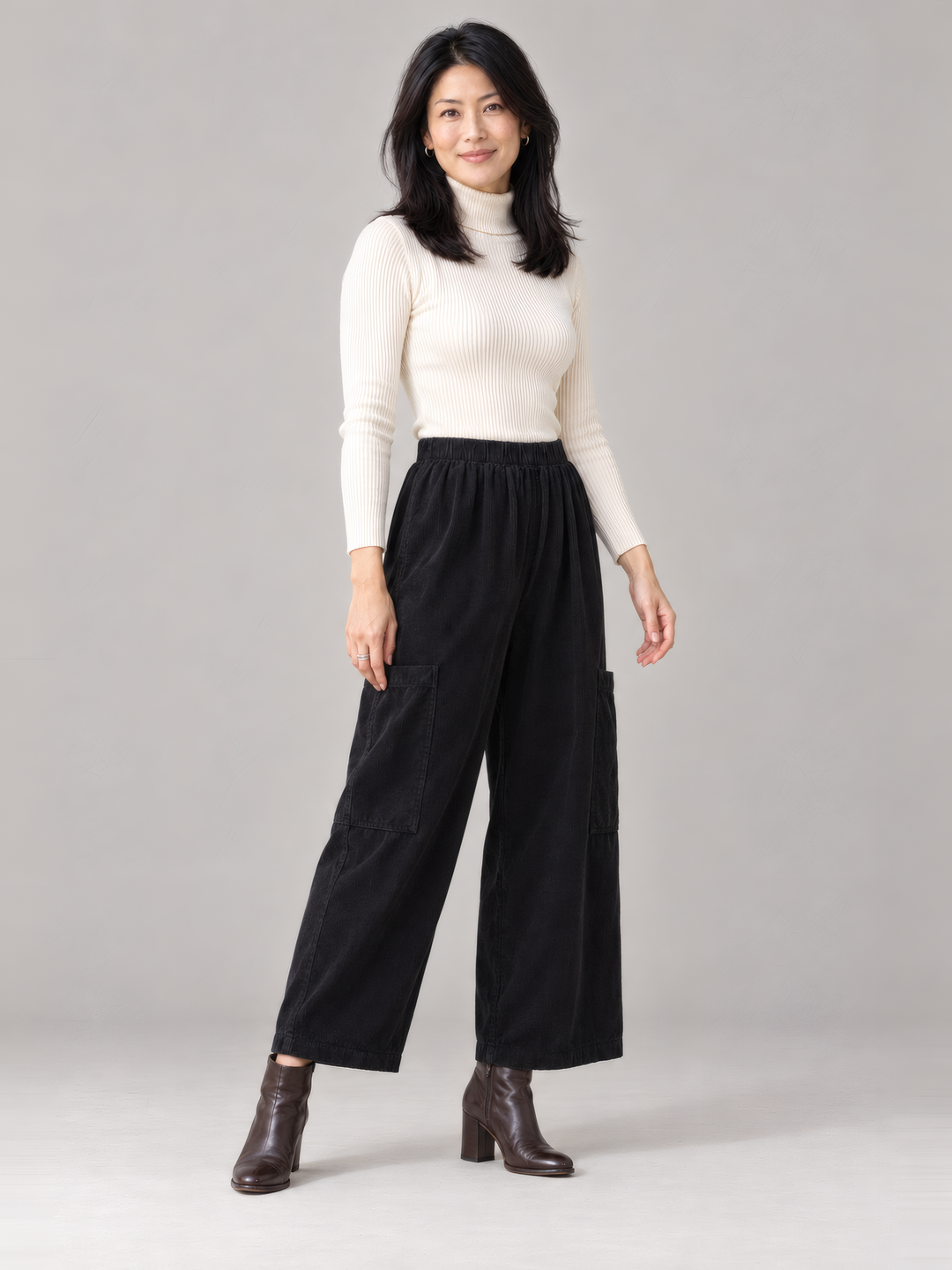 Bryn Walker Granada Corduroy Pasha Pant in Black, front view on model