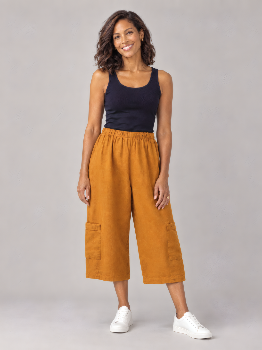 Bryn Walker Heavy Linen Casbah Pant in Persimmon, front view on model