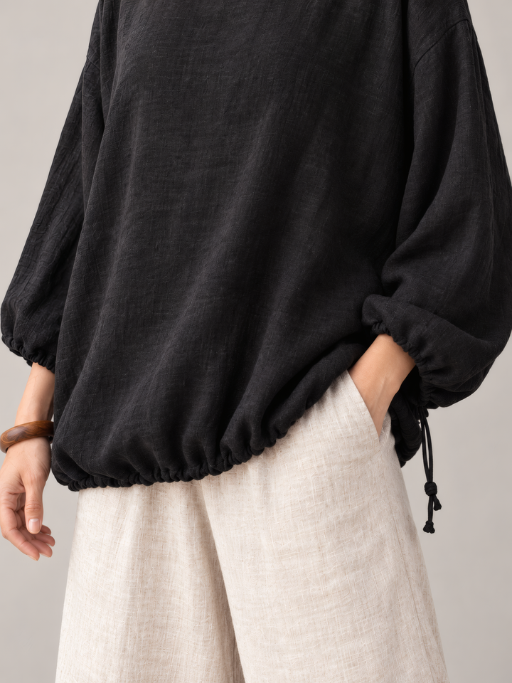 Bryn Walker Heavy Linen Gia Tunic in Black, close up of the fabric and details