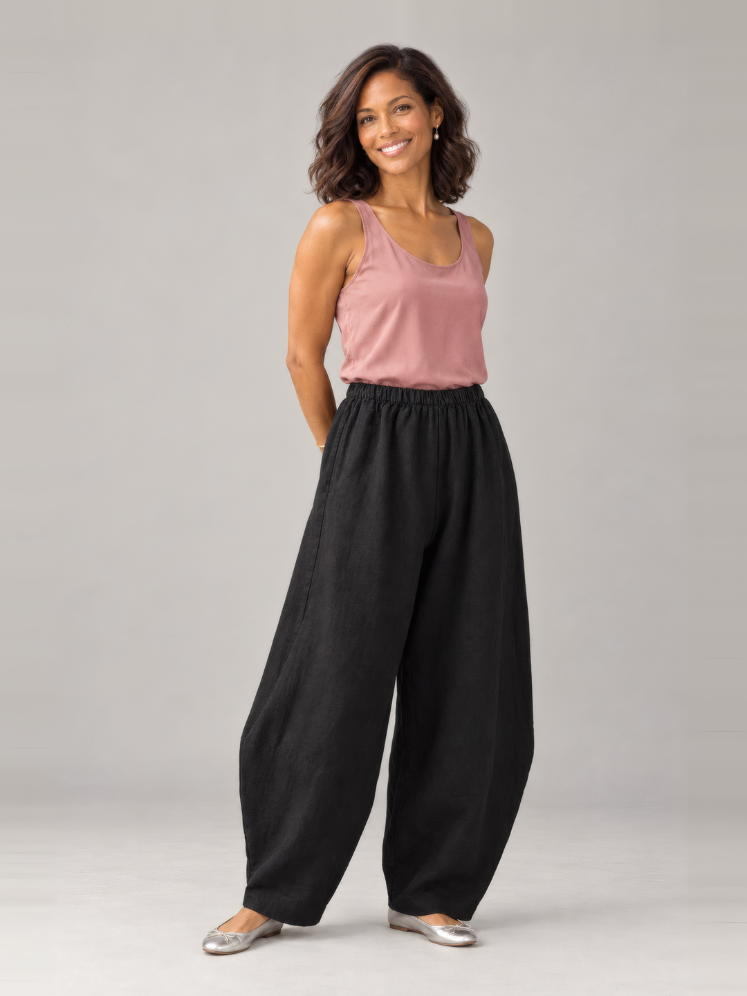 Bryn Walker Heavy Linen Oliver Pant in Black, front view on model