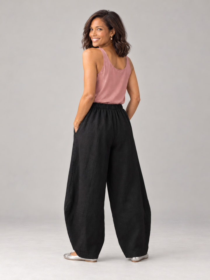 Bryn Walker Heavy Linen Oliver Pant in Black, back view on model