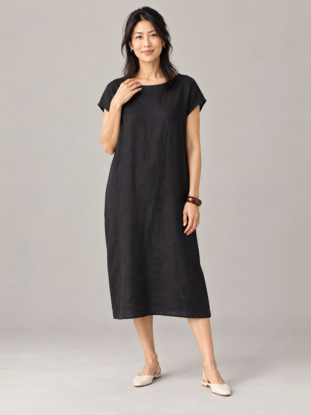 Bryn Walker Light Linen Ansley Dress in Black, front view on model