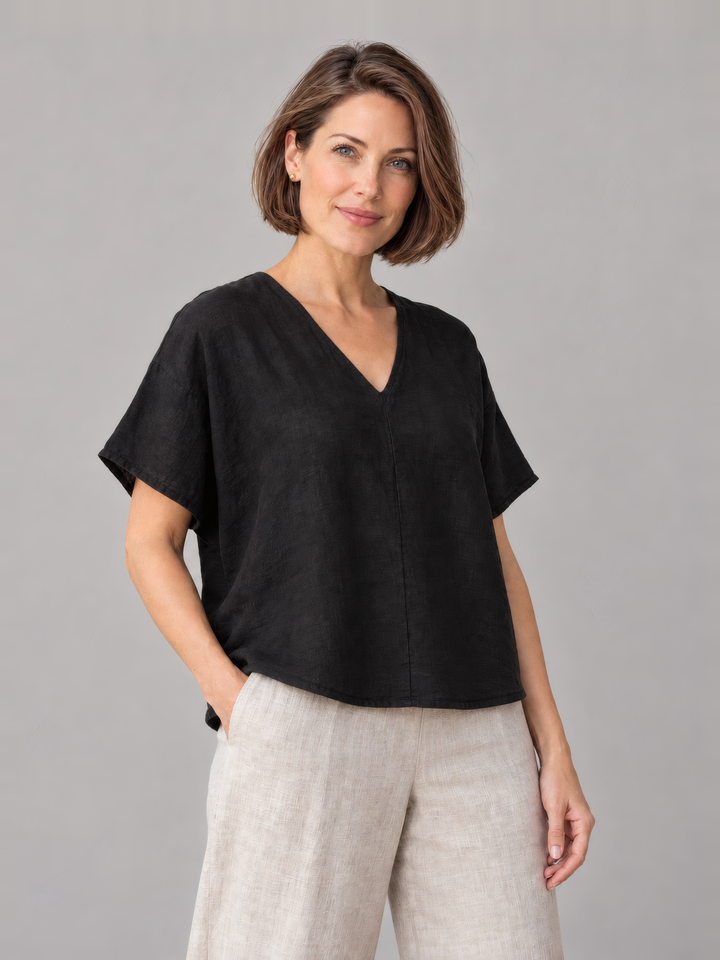 Bryn Walker Light Linen Baxter Tunic in Black, front view on model