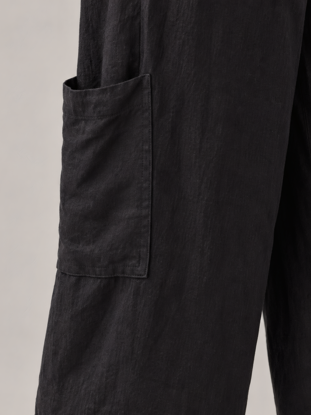 Bryn Walker Light Linen Casbah Pant in Black, close up of the fabric and details