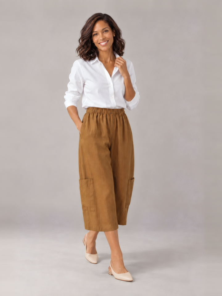 Bryn Walker Light Linen Casbah Pant in Quinquina, front view on model
