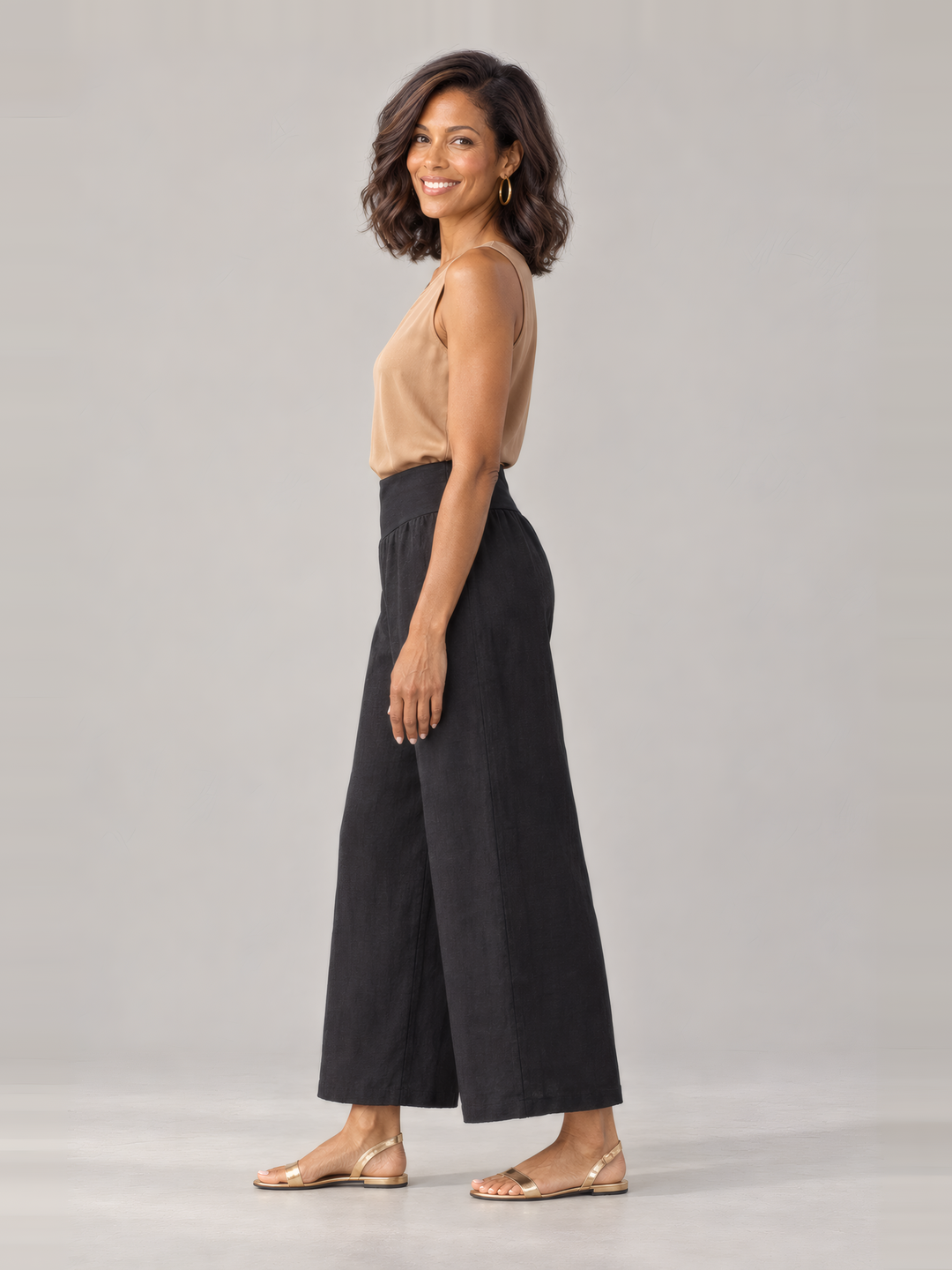 Bryn Walker Light Linen Ella Pant in Black, side view on model