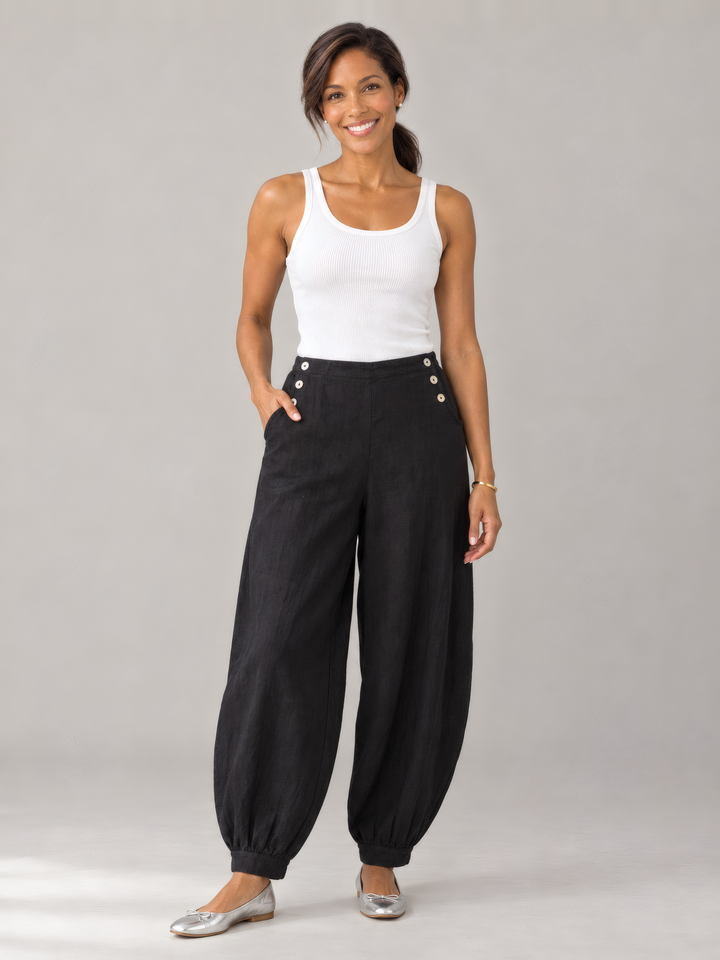 Bryn Walker Light Linen Genie Pant in Black, front view on model