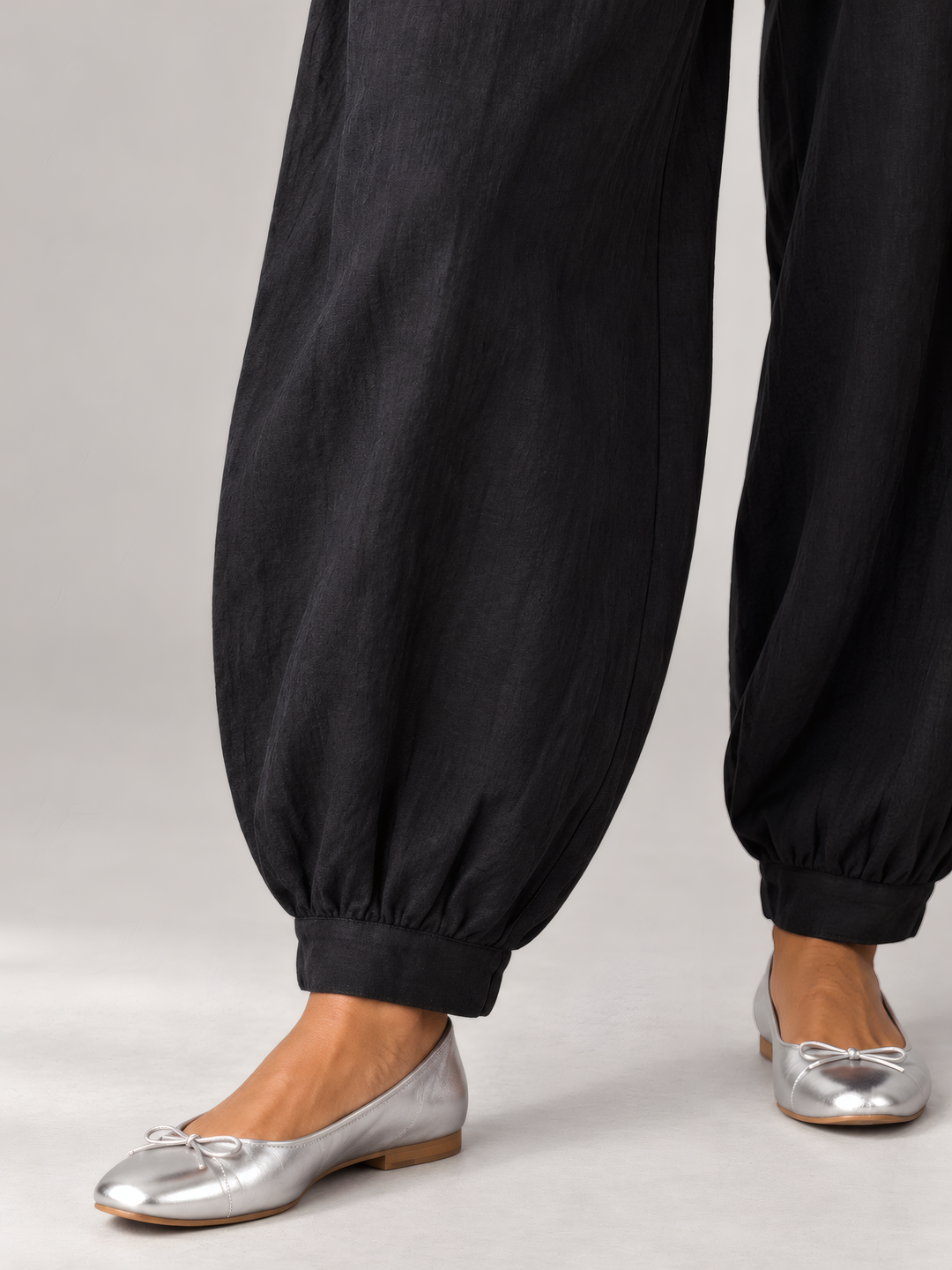 Bryn Walker Light Linen Genie Pant in Black, close up of the fabric and details