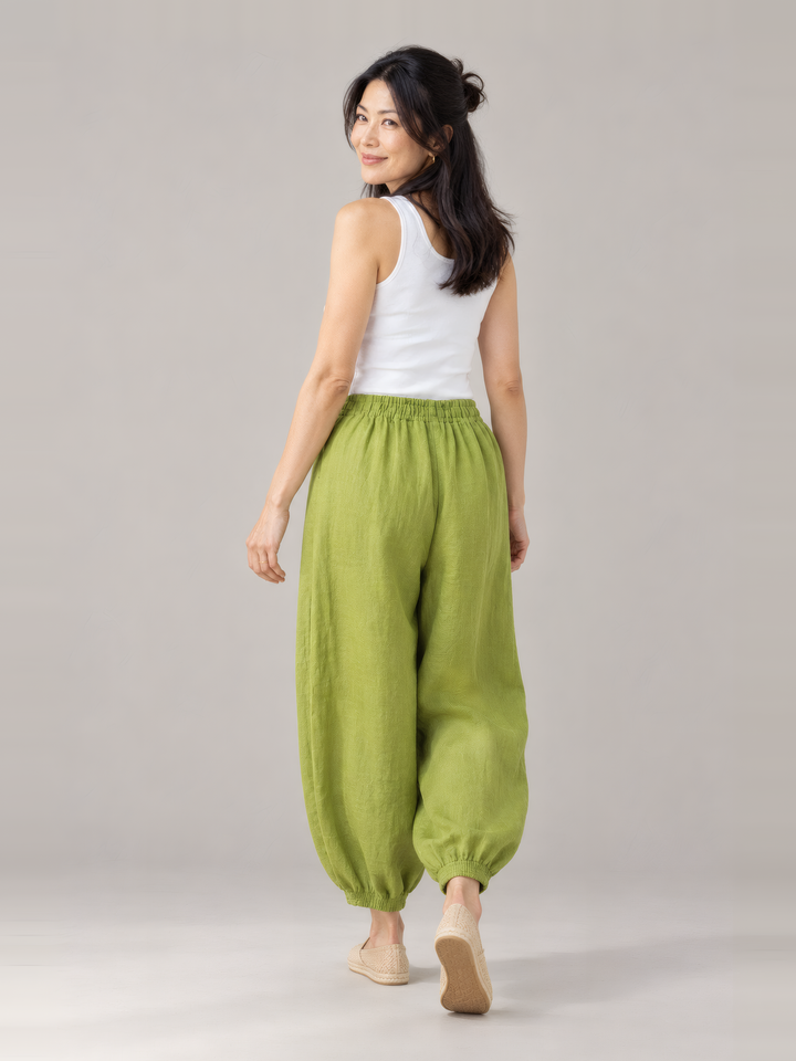 Bryn Walker Light Linen Genie Pant in Lacewing, back view on model