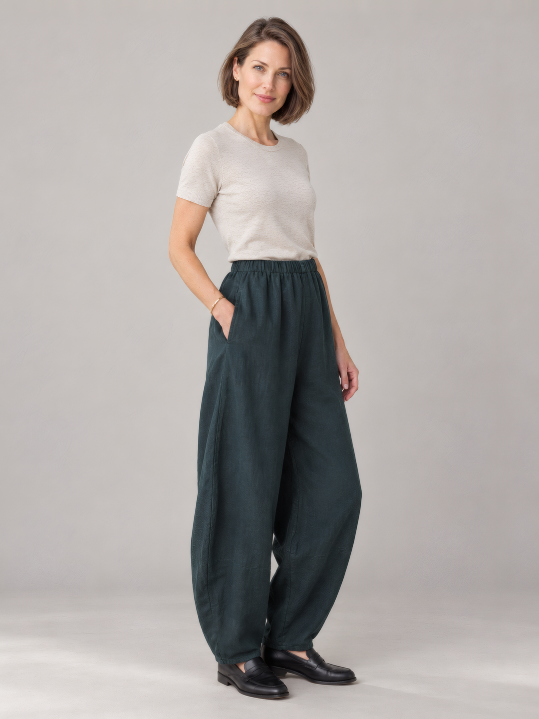 Bryn Walker Light Linen Oliver Pant in Lyrebird, front view on model