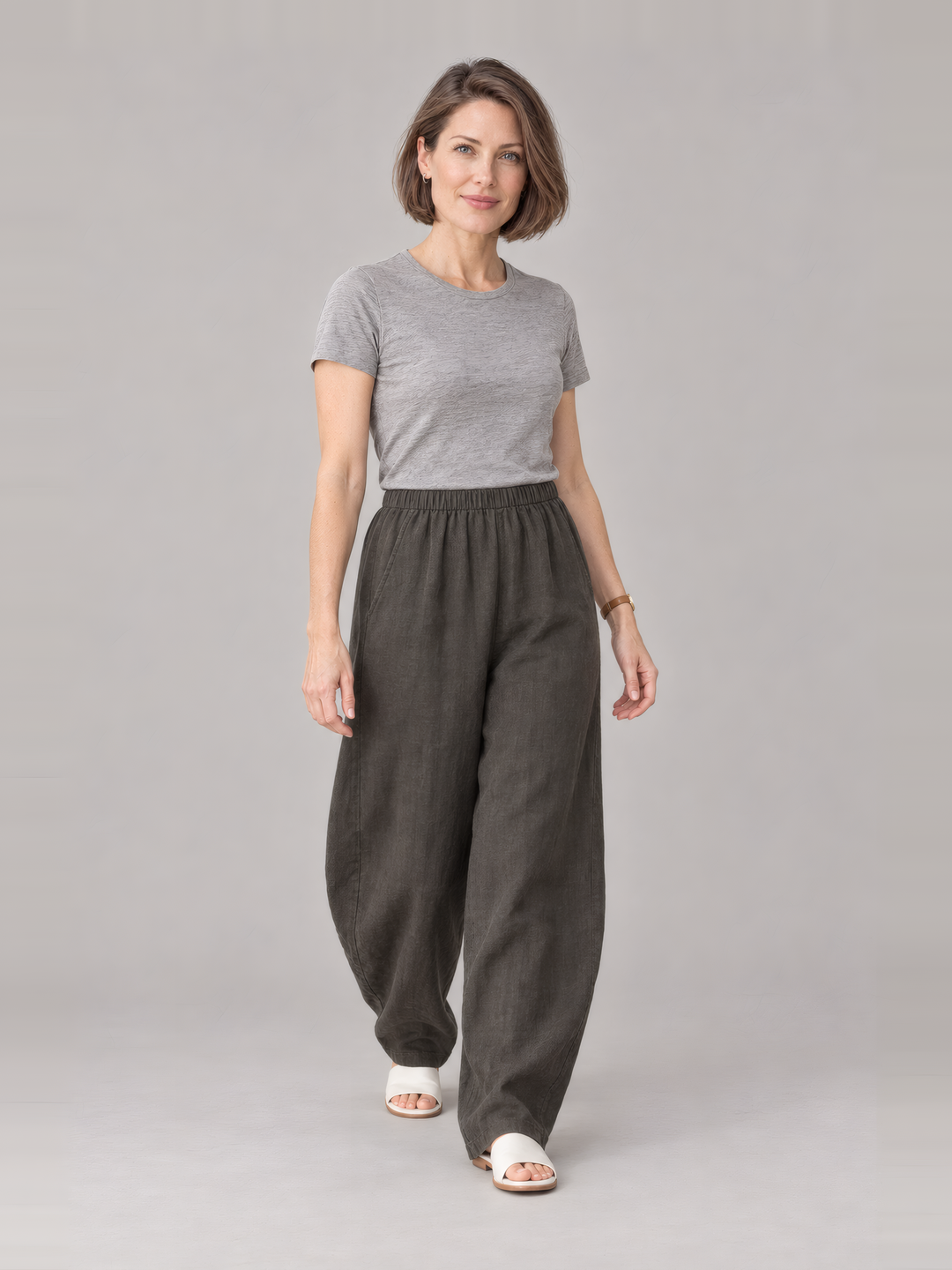 Bryn Walker Light Linen Oliver Pant in Peppercorn, front view on model