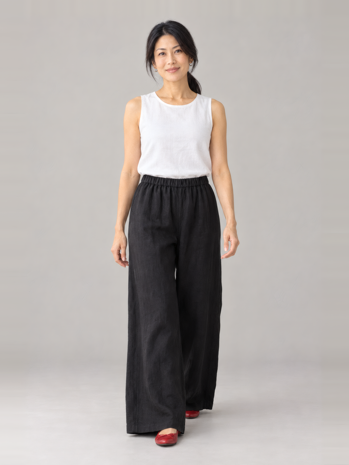 Bryn Walker Light Linen Osca Pant in Black, front view on model