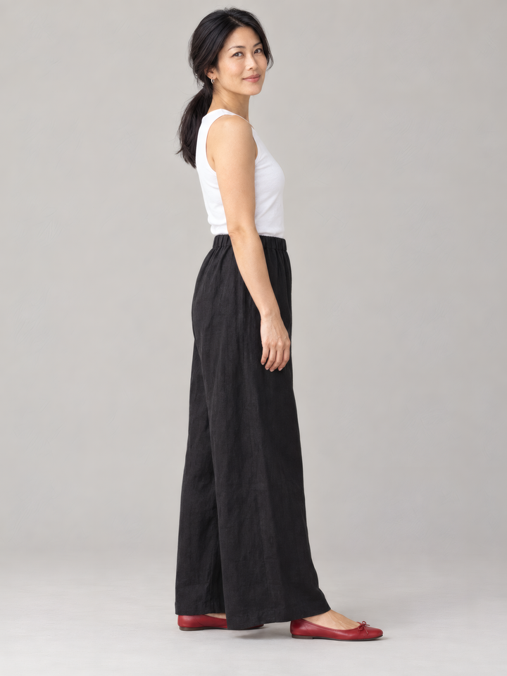 Bryn Walker Light Linen Osca Pant in Black, side view on model