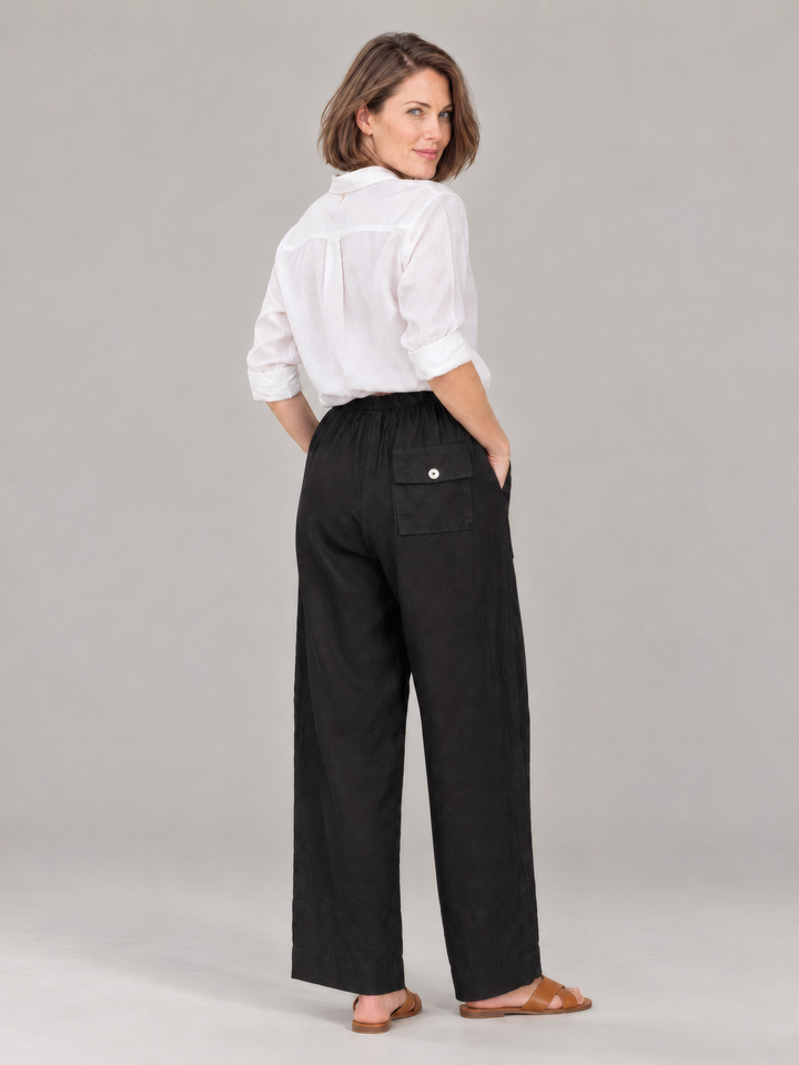Bryn Walker Light Linen Saba Pant in Black, back view on model