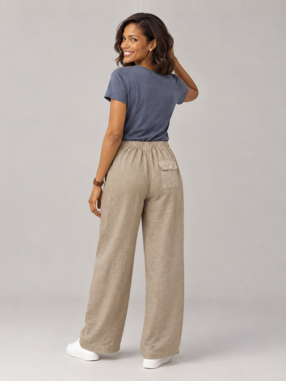 Bryn Walker Light Linen Saba Pant in Viscacha, back view on model