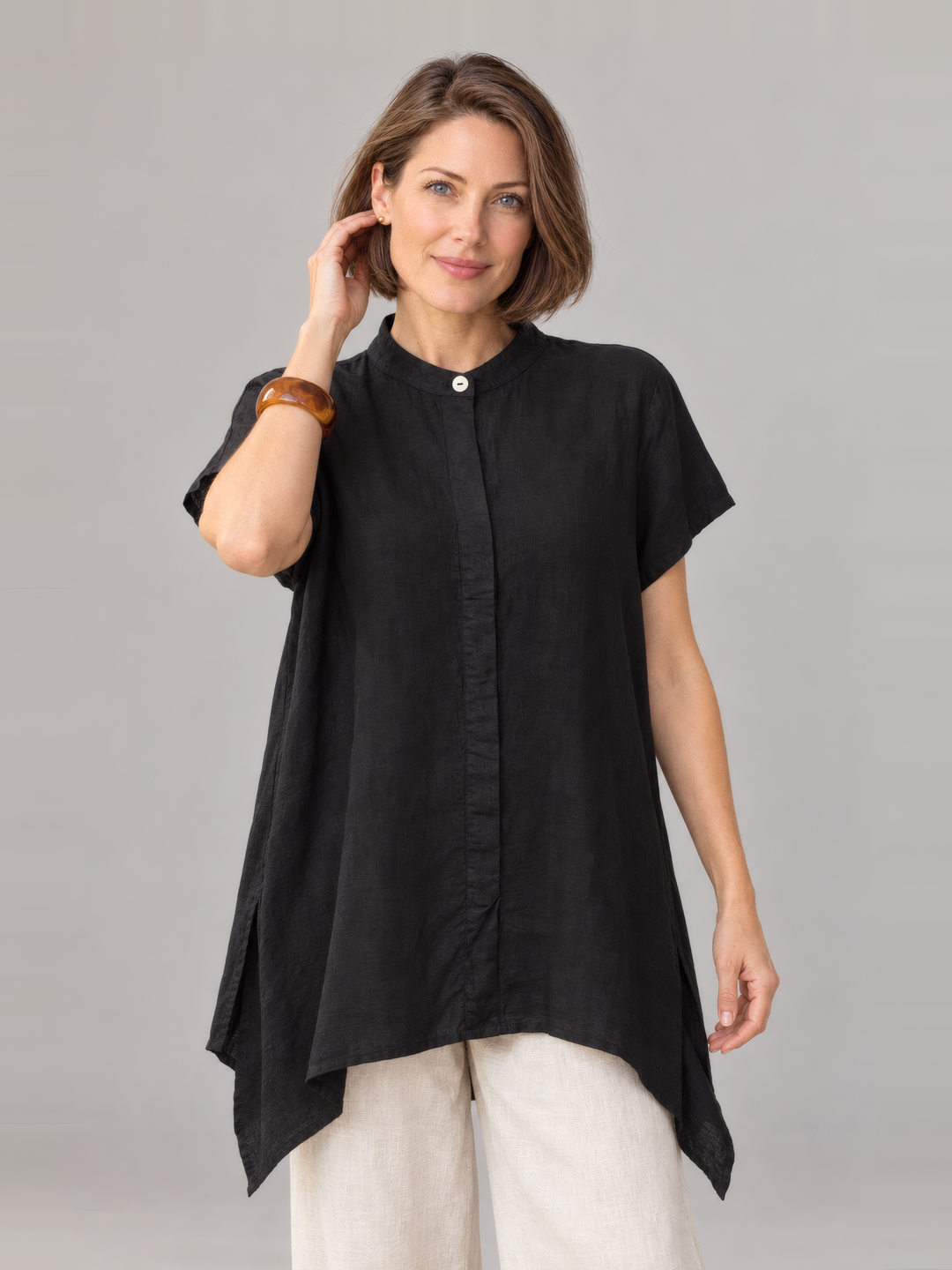 Bryn Walker Light Linen Willa Tunic in Black, front view on model