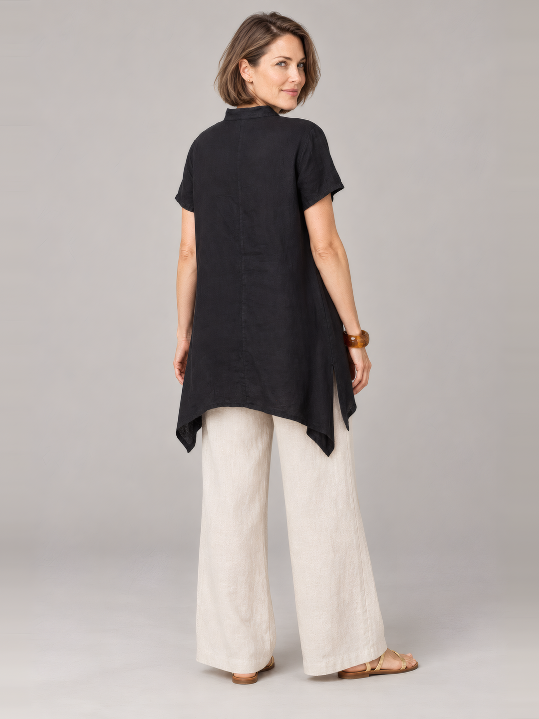 Bryn Walker Light Linen Willa Tunic in Black, back view on model