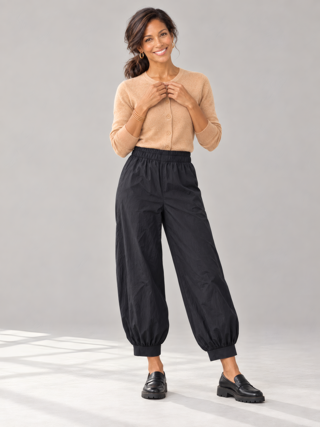 Bryn Walker Memory Crunch Wyatt Pant in Black, front view on model