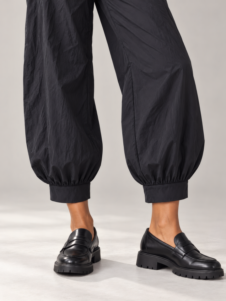 Bryn Walker Memory Crunch Wyatt Pant in Black, close up of the fabric and details