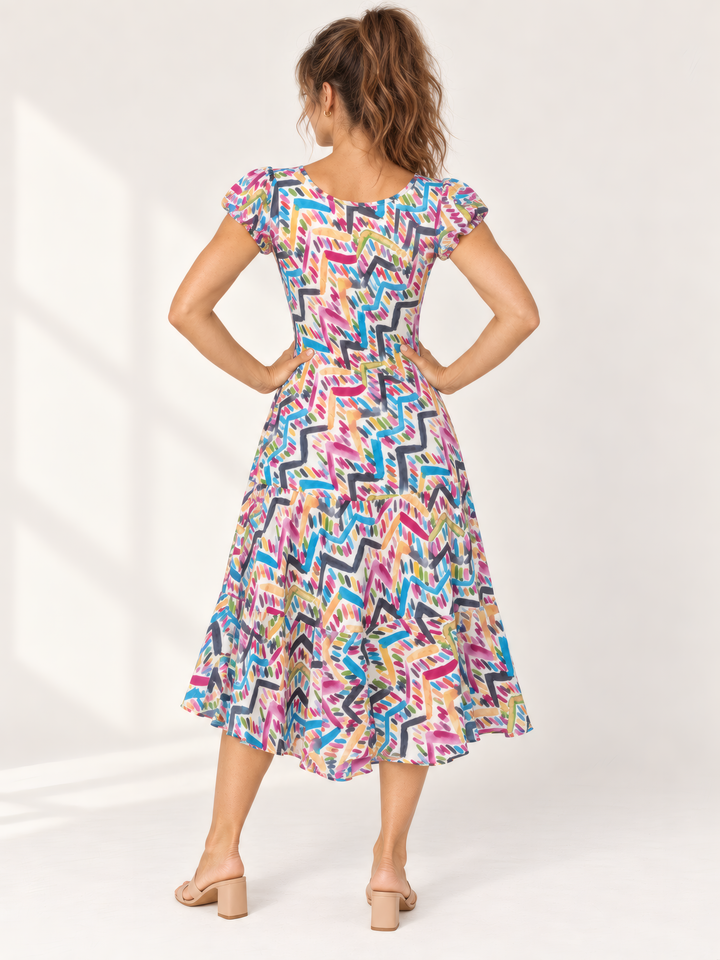 Dress Addict Jade Dress in Bright Colors, back view on model