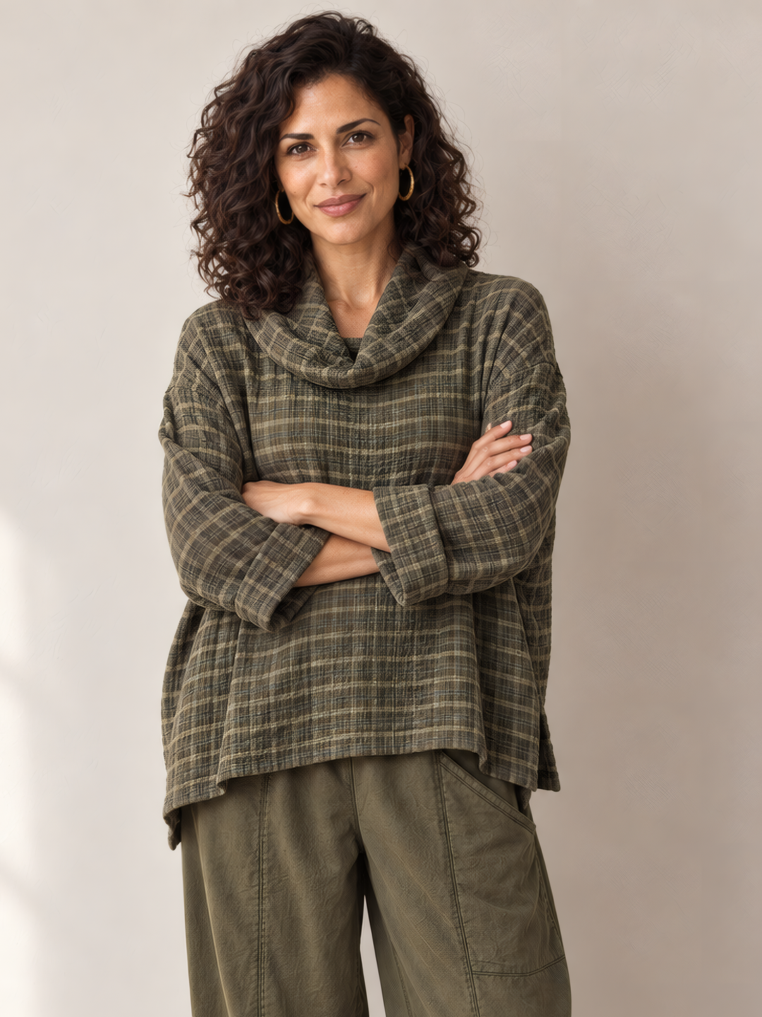 Eleven Stitch Design By Gerties Cowl Pullover in African Olive, front view on model