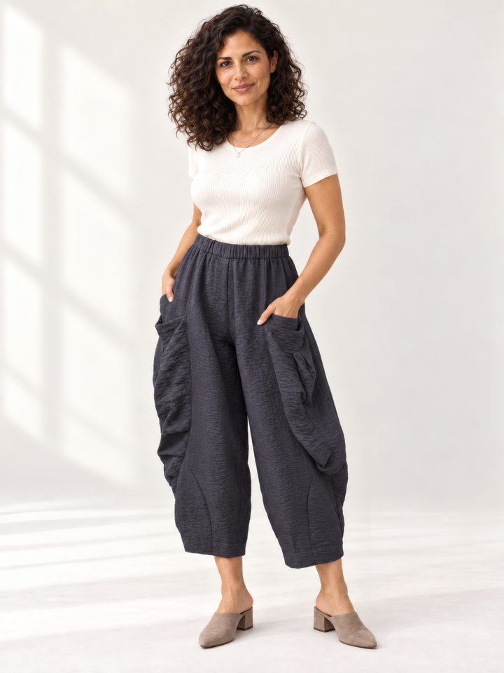 Eleven Stitch Design By Gerties Double Pocket Pant in Black Pearl, front view on model