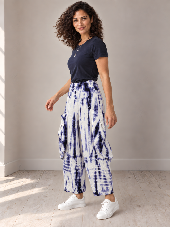 Eleven Stitch Design By Gerties Double Pocket Pant in Indigo, side view on model