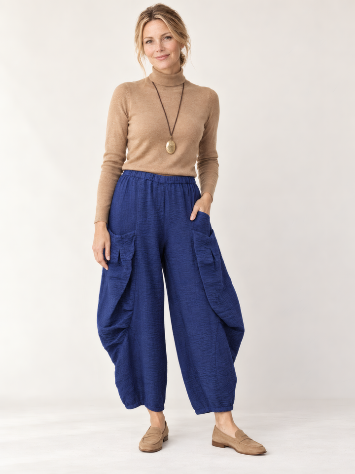 Eleven Stitch Design By Gerties Double Pocket Pant in Midnight, front view on model