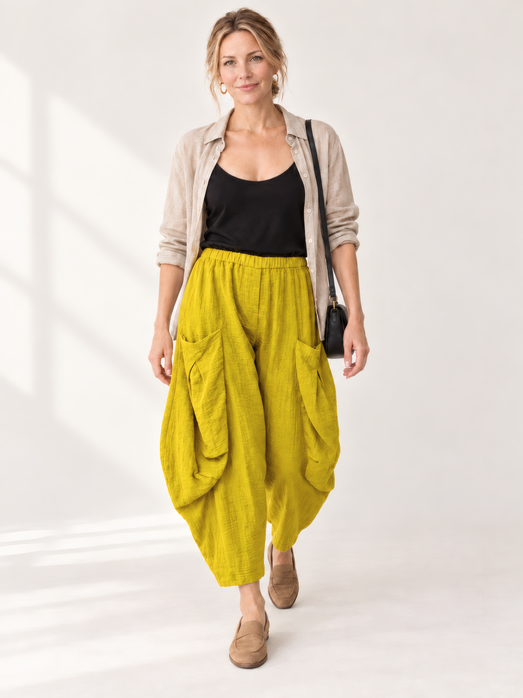 Eleven Stitch Design By Gerties Double Pocket Pant in Mustard, front view on model