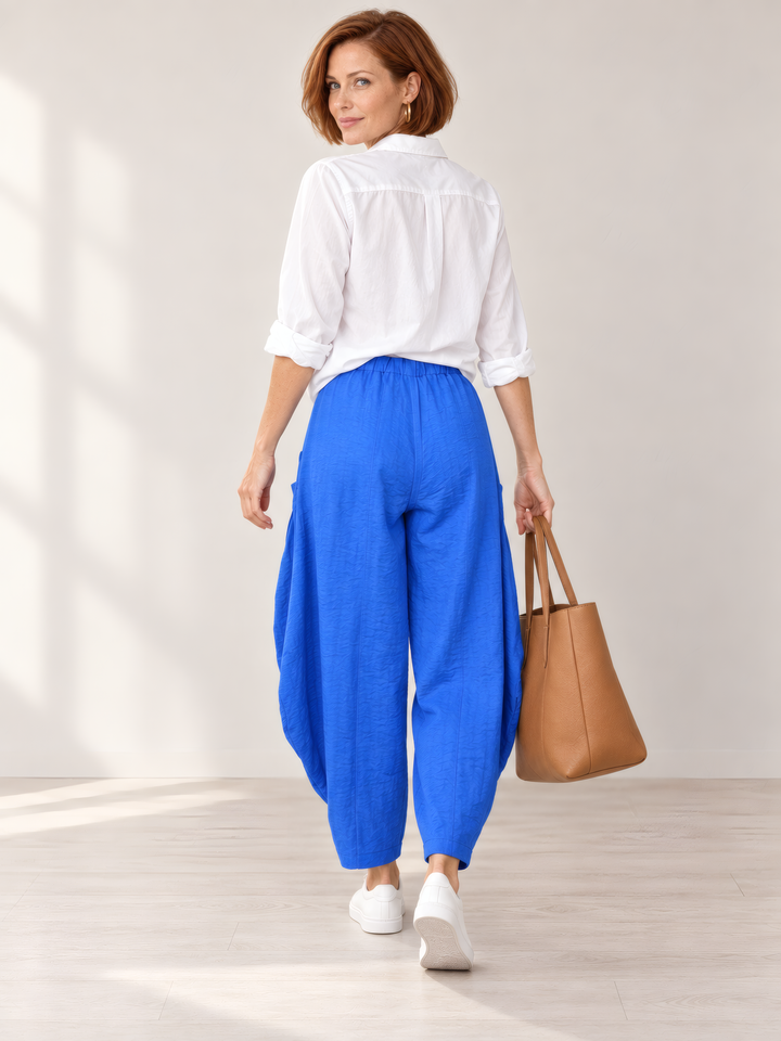 Eleven Stitch Design By Gerties Double Pocket Pant in Ocean, back view on model