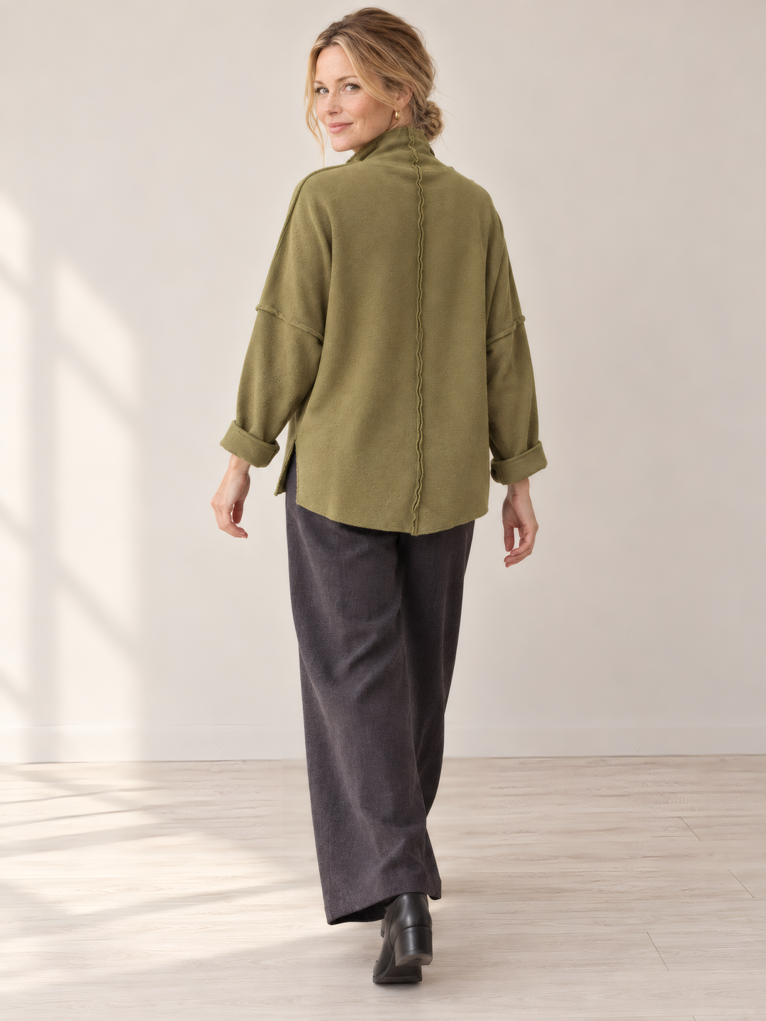 Eleven Stitch Design By Gerties Funnel Pullover in Teak, back view on model