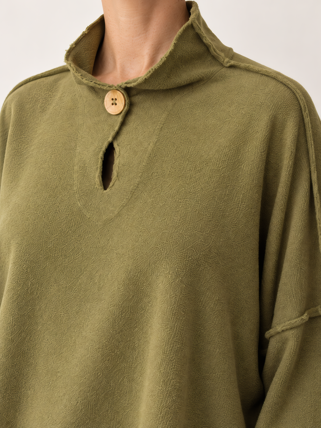 Eleven Stitch Design By Gerties Funnel Pullover in Teak, close up of the fabric and details