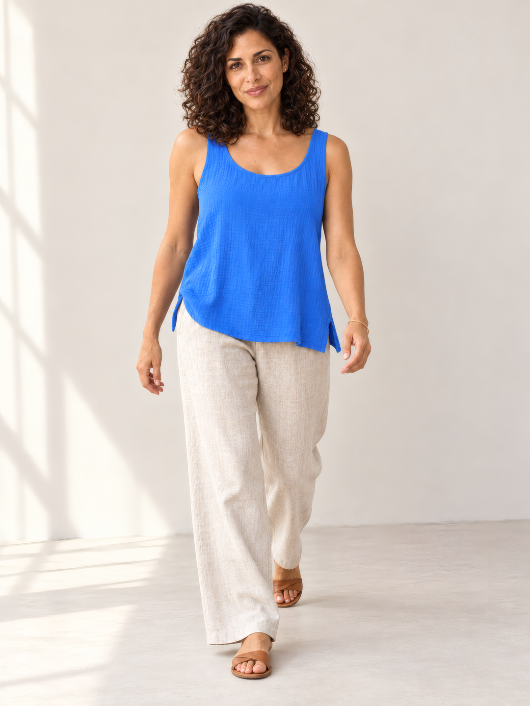 Eleven Stitch Design By Gerties Gails Tank in Ocean, on model, second angle