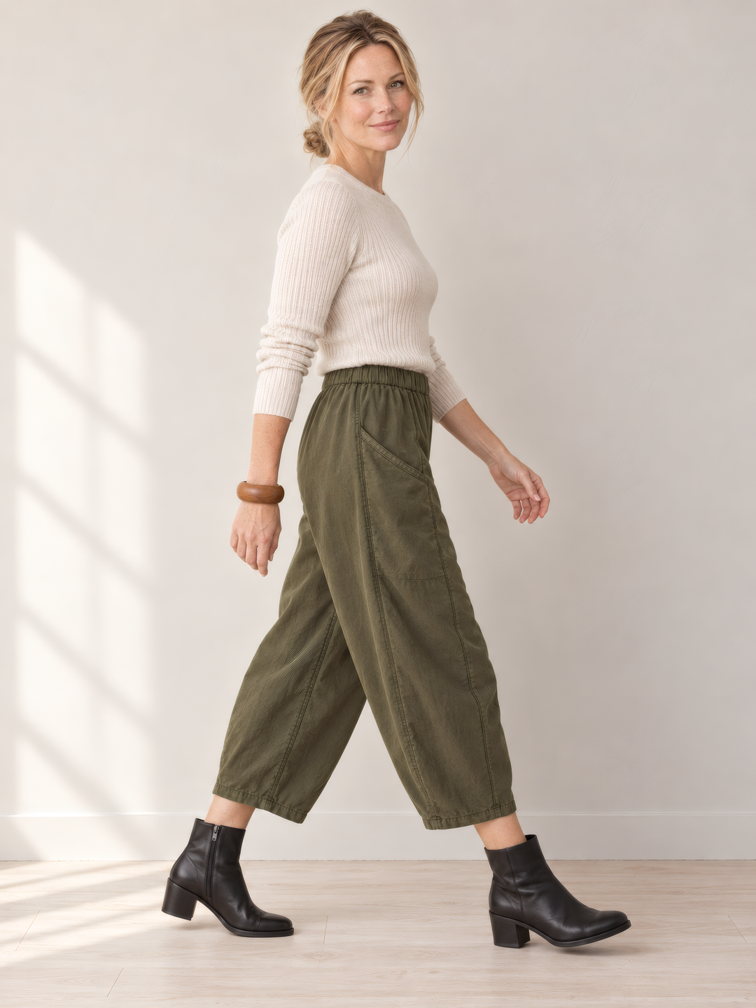 Eleven Stitch Design By Gerties Pocket Pant in African Olive, side view on model