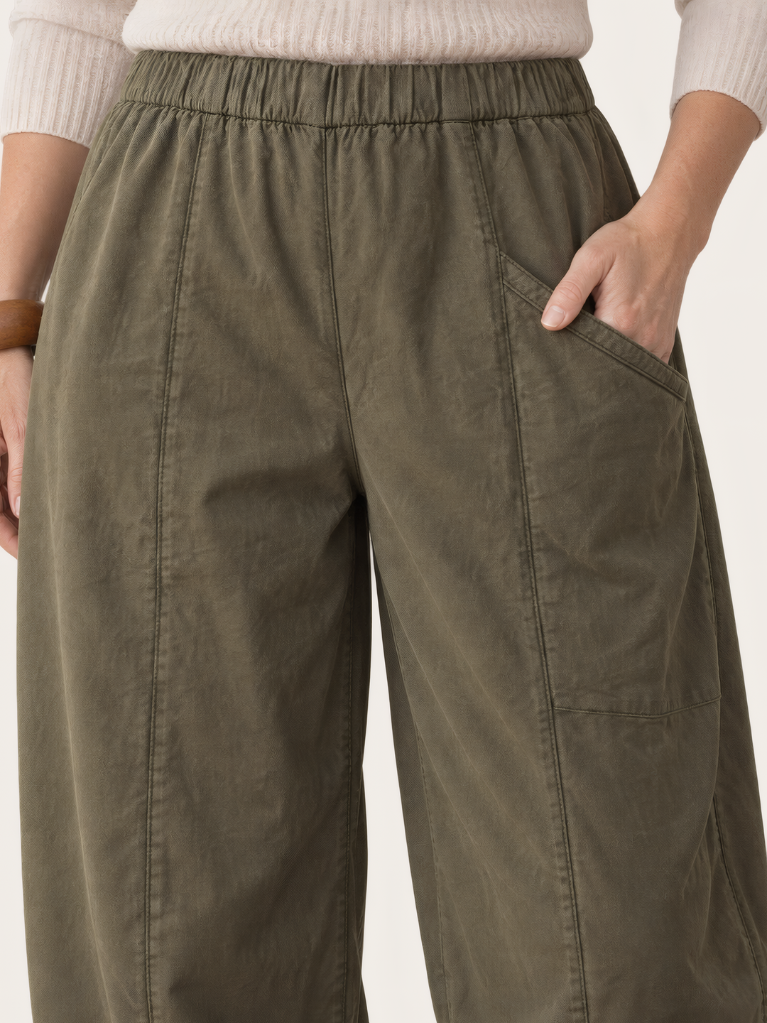 Eleven Stitch Design By Gerties Pocket Pant in African Olive, close up of the fabric and details